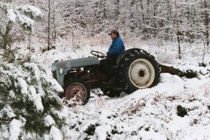 Tractor being used to remove snow in the first snow of Dec, 2002
